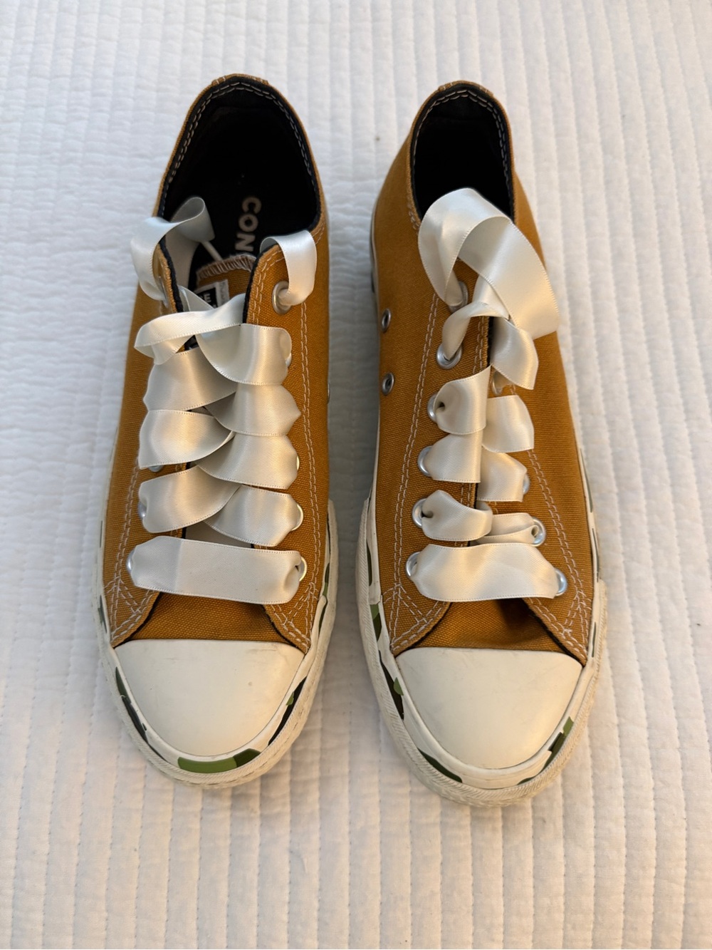 Converse Low-Top Sneakers in Mustard Yellow with White Satin Laces